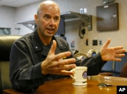 U.S. Navy Rear Admiral James Kilby, Commander, Carrier Strike Group One, talks to the media aboard the U.S. Navy aircraft carrier USS Carl Vinson (CVN 70) while on patrol off the disputed South China Sea, March 3, 2017.