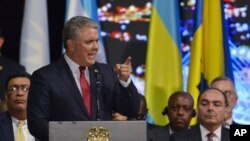 Le président colombien Ivan Duque à Medellin, en Colombie, le mercredi 26 juin 2019. (AP Photo / Luis Benavides)