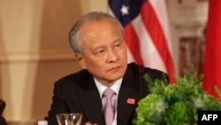 FILE - Cui Tiankai, China’s Ambassador to the U.S. participates in the Plenary Session of the U.S.-China Consultation on People-to-People Exchange during the seventh U.S.-China Strategic and Economic Dialogue at the US State Department in Washington.