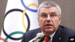 FILE - Thomas Bach and the IOC declined to ban the Russian Olympic team from the Rio Games.