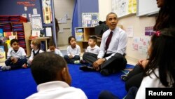 United States President Barack Obama sits with 3- and 4-year-old students in a pre-kindergarten class at Powell Elementary School in Washington, DC, March 2014. 