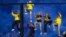 Boca Juniors' fans climb a fence during an Argentine First Division soccer match in Buenos Aires, May 5, 2013.