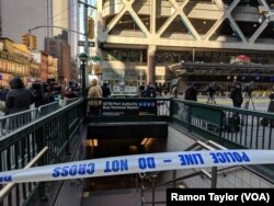 Police at the scene of explosion near Port Authority Bus Terminal in New York City, Dec. 11, 2017.