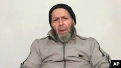 An image made from video released anonymously to reporters in Pakistan on Dec. 26, 2013 shows 72-year-old American development worker Warren Weinstein, who was kidnapped by al-Qaida, appealing to President Obama to negotiate his release.