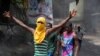 People protest against the assassination of Haitian President Jovenel Moïse near the police station of Petion Ville in Port-au-Prince, Haiti, July 8, 2021.