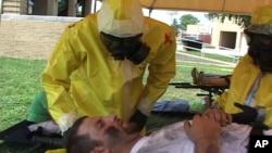 Soldiers practice treating wounds after simulated nuclear attack