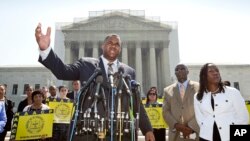 Ryan P. Haygood, director of the NAACP Legal Defense Fund, talks outside the Supreme Court.