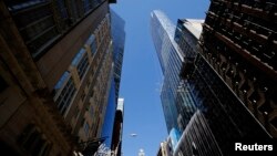 FILE - One57, luxury skyscraper apartment building is seen on New York City's West 57th Street, April 24, 2014.