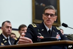 FILE - Gen. Joseph Votel, head of U.S. Central Command, testifies before the House Armed Services Committee on Capitol Hill in Washington, March 7, 2019.