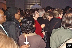 UN staffers at candlelight vigil honoring UN victims from Haiti's earthquake, 19 Jan 2010