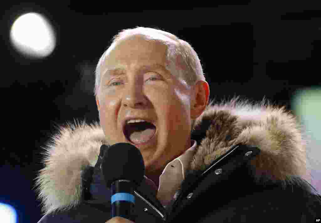 Russian President Vladimir Putin speaks to supporters during a rally near the Kremlin in Moscow, March 18, 2018. Putin won a fourth term as Russia&#39;s president, adding six more years in the Kremlin for the man who has led the world&#39;s largest country for all of the 21st century.