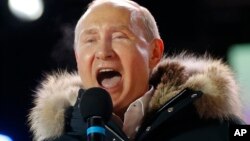 Shugaban Rasha Vladimir Putin yayinda yake murnar sake lashe zaben shugaban kasa