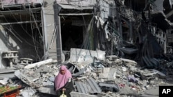 Geçici ateşkes sayesinde bazı Gazzeliler yaşadıkları yerlere geri dönüyor