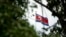 The North Korean flag flies above the North Korean Embassy in Beijing, April 20, 2017. The South Korean news agency says North Korea has detained a third U.S. citizen.