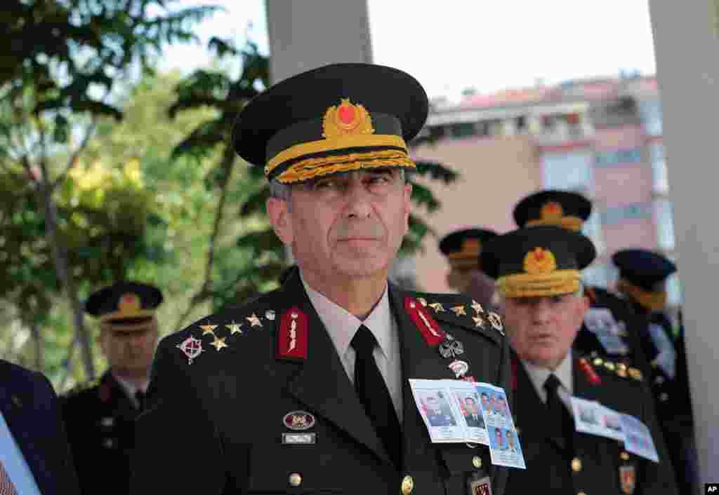 Turkish Land Forces commander Gen. Salih Zeki Colak stands with army commanders as they attend a mass funeral after a failed military coup last Friday, at Kocatepe Mosque in Ankara, Turkey, July 17, 2016.