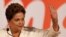 Brazil's President Dilma Rousseff, presidential candidate for re-election of the Workers Party, PT, reacts during a press conference, in Brasilia, Brazil, Oct. 5, 2014. 