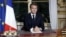 French President Emmanuel Macron addresses the French nation following a massive fire at Notre Dame Cathedral, at the Elysee Palace in Paris, France, 16 April 2019. Yoan Valat/Pool via REUTERS