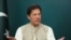 FILE - Pakistan's Prime Minister Imran Khan gestures during an interview with Reuters in Islamabad, June 4, 2021.