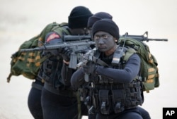 FILE - Taiwan's "frogmen" Marines perform covert landing drills just a few kilometers from mainland China on the outlying island of Kinmen, Taiwan.