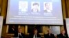 Per Delsing, left, Staffan Nordmark, centre left, Anne L´Huillier and Olle Inganas announce the Nobel prize laureates in physics - Isamu Akasaki, Hiroshi Amano and Shuji Nakamura - at the Royal Swedish Academy of Science in Stockholm, Oct. 7, 2014. 