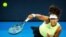 TOPSHOT - Japan's Naomi Osaka serves against Germany's Tamara Korpatsch during their women's singles match at the Brisbane International tennis tournament in Brisbane on Jan. 1, 2024. 