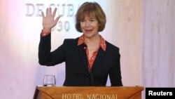 Minnesota Lt. Governor Tina Smith waves to journalists at the end of a news conference in a Hotel in Havana, Cuba, June 22, 2017.