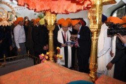 U.N. Secretary General Antonio Guterres, center, visits the Sikh Gurdwara Darbar Sahib, in Kartarpur, Pakistan, Feb. 18, 2020.(Courtesy @antonioguterres)