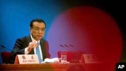 Le Premier ministre chinois Li Keqiang donnant une conférence de presse, Pékin, le 20 mars 2018.
