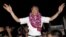 Prime Minister Lee Hsien Loong celebrates his party's election victory with supporters at a stadium in Singapore, Sept. 12, 2015. 