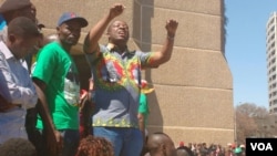 Kudzai Chipanga addressing Zanu PF supporters at the party's headquarters on Sunday.