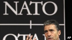 NATO Secretary General Anders Fogh Rasmussen holds a news conference at the Alliance headquarters in Brussels, April 18, 2012.