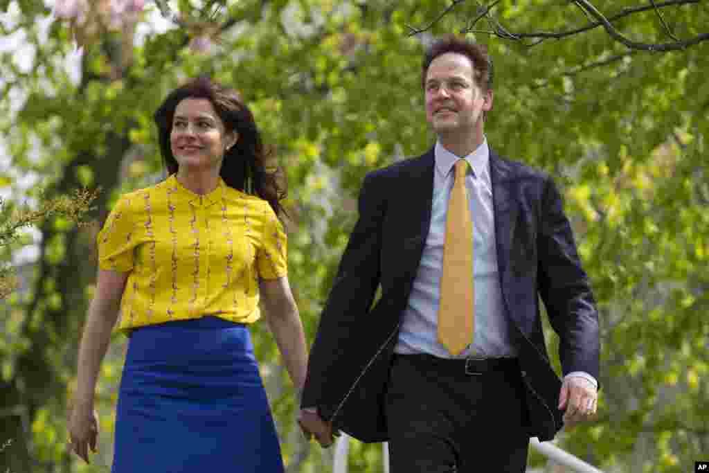 Liberal Democrat leader Nick Clegg and his wife Miriam Gonzalez Durantez on their way to vote at the Hall Park Center in Sheffield, May 7, 2015.