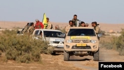 Les forces de la SDF entre dans le nord de Raqa, le 16 décembre 2015. 