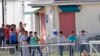US Lawmakers Tour Florida Migrant Teen Camp, Want Policy Shift