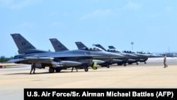 FILE - Six U.S. F-16 Fighting Falcons from Aviano Air Base, Italy, arrive at Incirlik Air Base, Turkey, to take part in anti-Islamic State missions, Aug. 9, 2015.