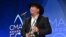Garth Brooks, winner of the award for entertainer of the year, participates in an interview in the press room at the 50th annual CMA Awards at the Bridgestone Arena in Nashville, Tennessee, Nov. 2, 2016.