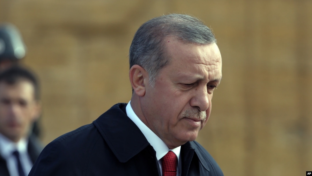 Turkish President Recep Tayyip Erdogan walks to the mausoleum of Turkey's founder Mustafa Kemal Ataturk on Republic Day in Ankara, Turkey, Oct. 29, 2015.