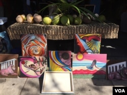 Haitian art on display in front of the Caribbean Marketplace in Little Haiti, Miami, Florida. (Photo: S. Lemaire)