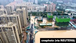 Pemandangan dari udara menunjukkan daerah yang tergenang setelah hujan deras di Zhengzhou, Provinsi Henan, China, 21 Juli 2021. (Foto: cnsphoto via REUTERS)