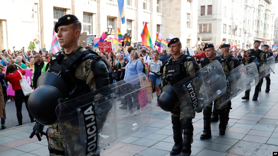 Policemen guard the country's first ever LGBT pride parade in downtown Sarajevo, Bosnia-Herzegovina, Sept. 8, 2019. 
