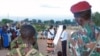 An aid worker talks to soldiers and scouts in Juba in October 2005, about how to spread the message on HIV/AIDS. HIV infections are down in South Sudan, a government report says. file photo)