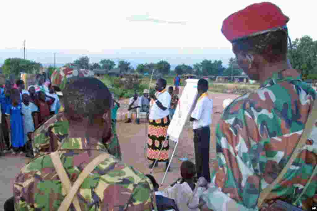 The recent report about a decline in HIV/AIDs infection rates in South Sudan should not be interpreted to mean that the disease is coming to an end. Instead, we should take this as an opportunity to change our ways. - James Mabusu in Maridi, Western Equatoria state A Sudanese aid worker talks to soldiers and scouts on how to spread the message on HIV/AIDS at an internally displaced camp in Juba, southern Sudan, October 2005. The HIV-infection rate in South Sudan fell slightly last year, a government report showed. (file photo)