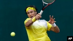 Juan Monaco dari Argentina menang mudah dan maju ke perempat final Swiss Terbuka (foto: dok). 