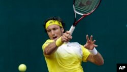 Juan Monaco mengalahkan Jeremy Chardy dengan skor 6-0, 7-6 dalam babak ketiga turnamen Barcelona Terbuka (foto: Dok).