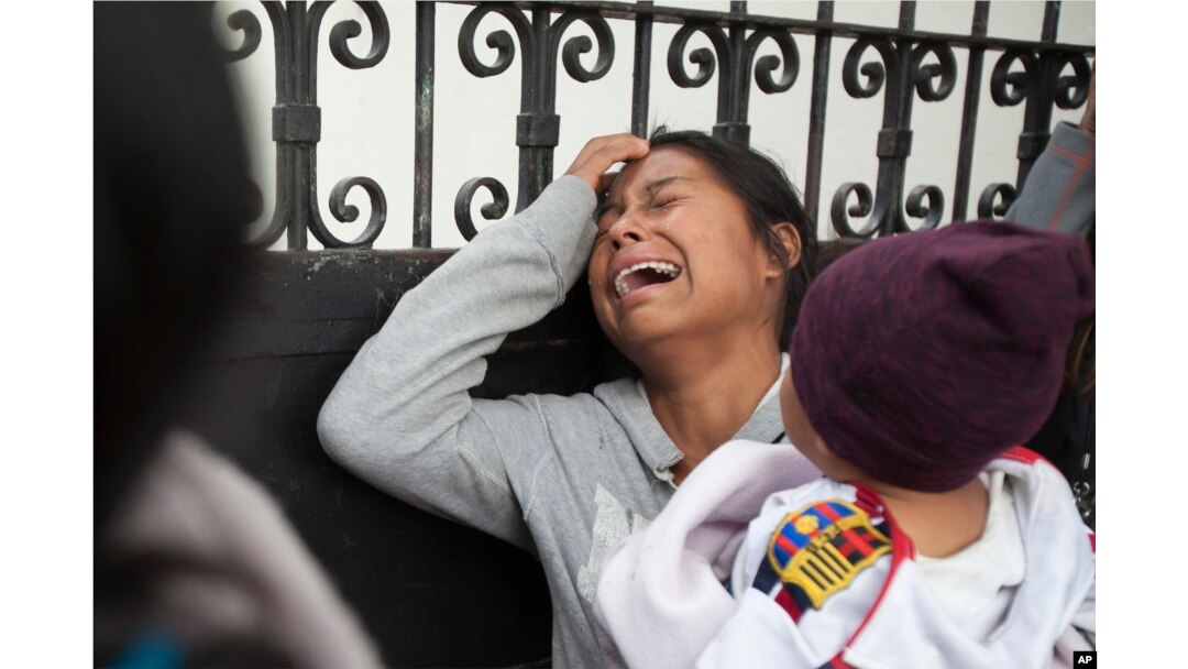 A relative of a youth who resided at the Virgin of the Assumption Safe Home wails as she waits for the release of the names of those who died in a fire at the shelter, outside the morgue where the bodies are being identified in Guatemala City, March 9, 20