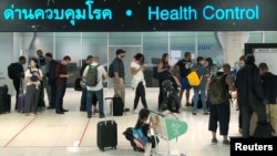 Tourist line-up in a health control at the arrival section at Suvarnabhumi international airport in Bangkok, Thailand, Januaruy 19, 2020