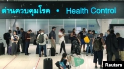 Tourist line-up in a health control at the arrival section at Suvarnabhumi international airport in Bangkok, Thailand, Januaruy 19, 2020