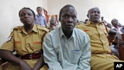 Thomas Kwoyelo, a former director of field operations in the rebel group Lord's Resistance Army appears before a War Crimes Court in Gulu, Uganda, July 2011. (file photo)