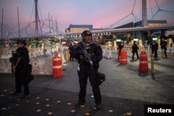 U.S. Customs and Border Protection Special Response Team officers stand guard at the San Ysidro Port of Entry after the land border crossing was temporarily closed to traffic from Tijuana, Mexico, Nov. 19, 2018.