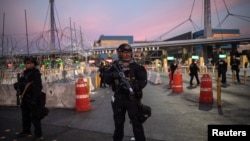 U.S. Customs and Border Protection Special Response Team officers stand guard at the San Ysidro Port of Entry after the land border crossing was temporarily closed to traffic from Tijuana, Mexico, Nov. 19, 2018.